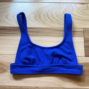 Royal blue, unsure of the size but I would guess xs/s, brand xhilaration